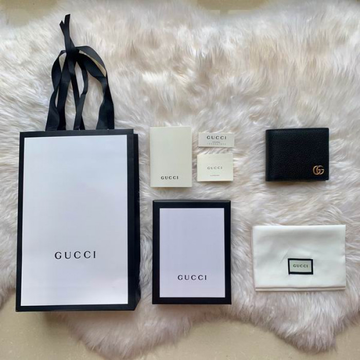 G*u*i wallet 428726 11*9